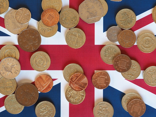 Pound coins, United Kingdom over flag