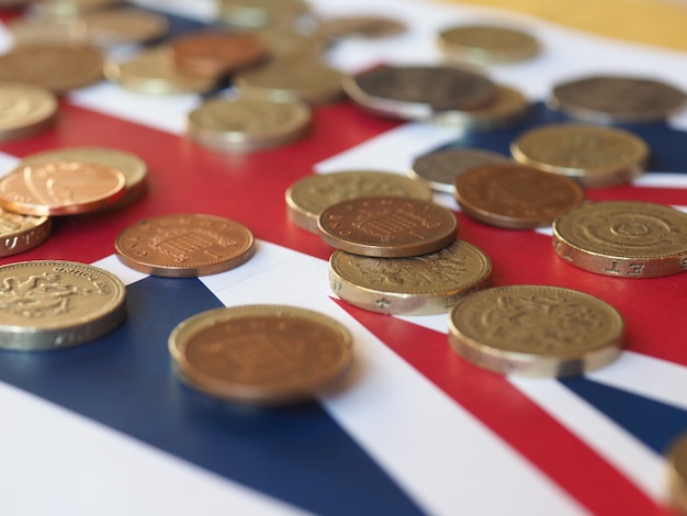 Pound coins, United Kingdom over flag