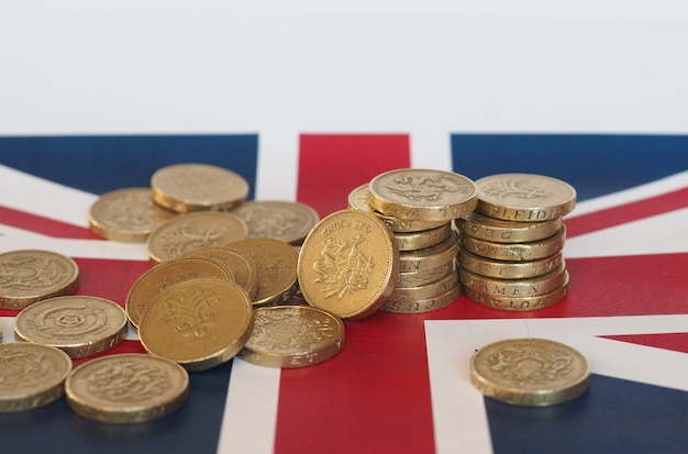 Pound coins, United Kingdom over flag