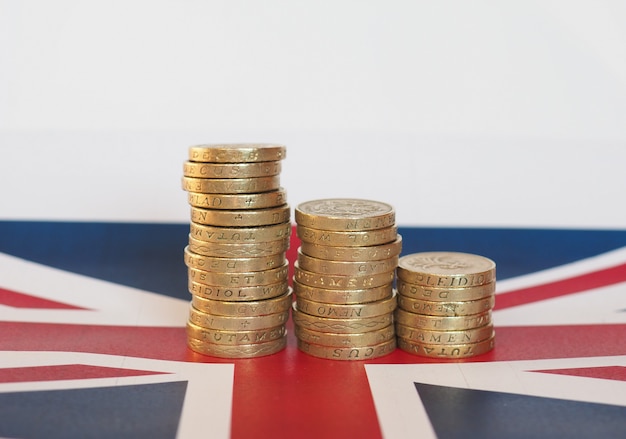 Pound coins, United Kingdom over flag