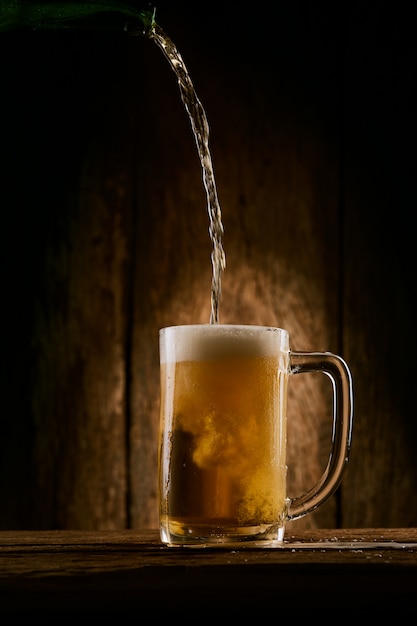 Pouring beer into the glass