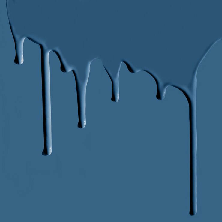 Pouring classic blue paint on blue.
