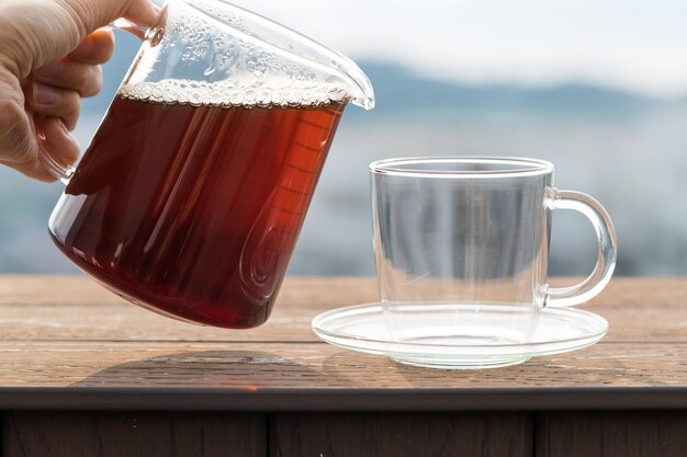 Pouring coffee into a glass