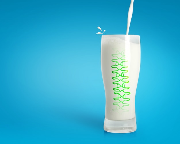 Pouring fresh milk in glass with strong spine on blue background. healthy drink background.