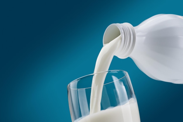 Pouring fresh milk into a glass