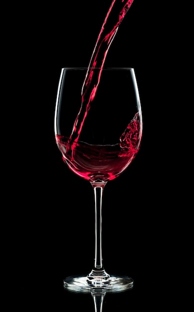 Pouring Red Wine into a Glass