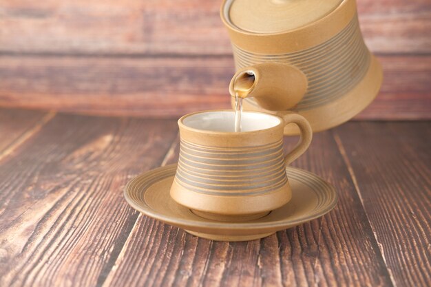 Pouring tea from a tea ceremony top down