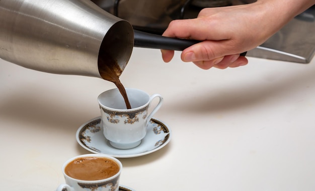 Pouring turkish coffee