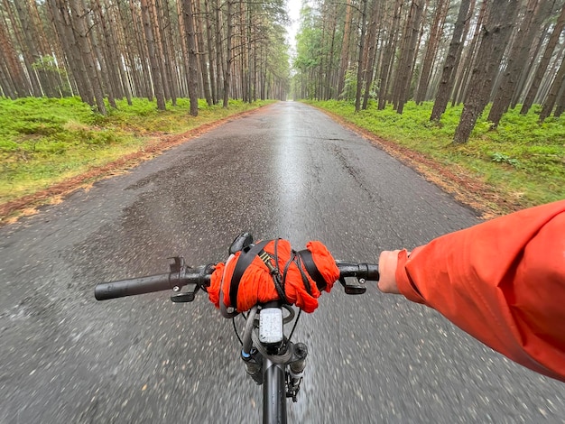 POV bike handlebar closeup Concept of riding a bicycle outdoors