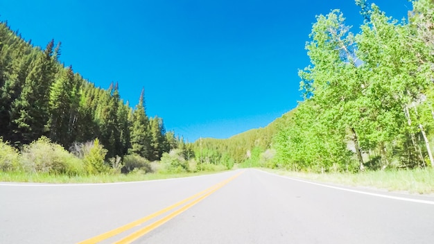 POV point of view -  Driving on small road in the mountains.