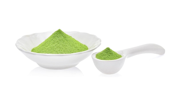 Powder green tea isolated on white background