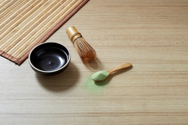 Powdered green tea with bamboo whisk