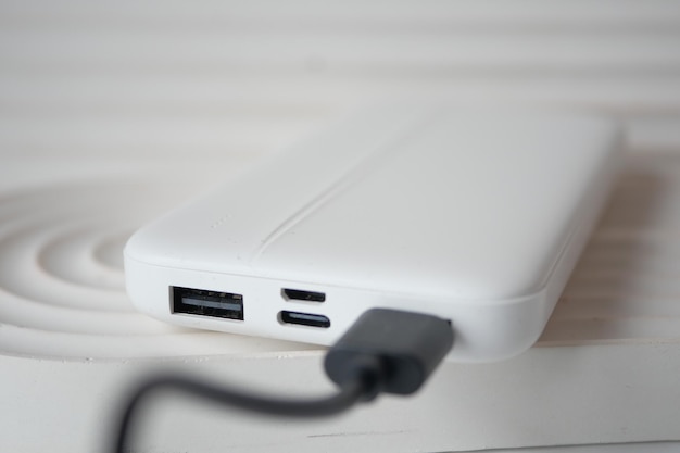 power bank for charging mobile devices on table