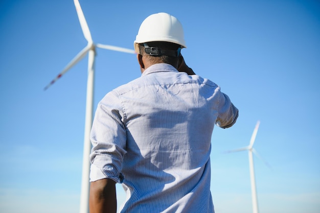 Power engineer are working with wind turbines.