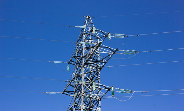 Power line Power line against the blue sky Electricity transmissionPower line support