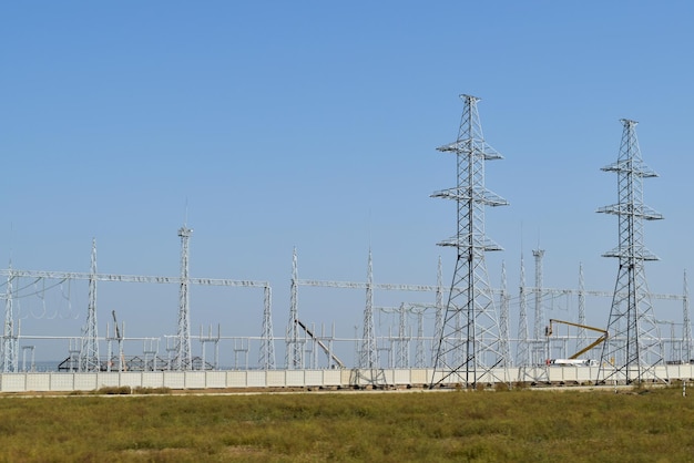 Power line support insulators and wires Appearance of a design Assembly and installation of new support and wires of a power line