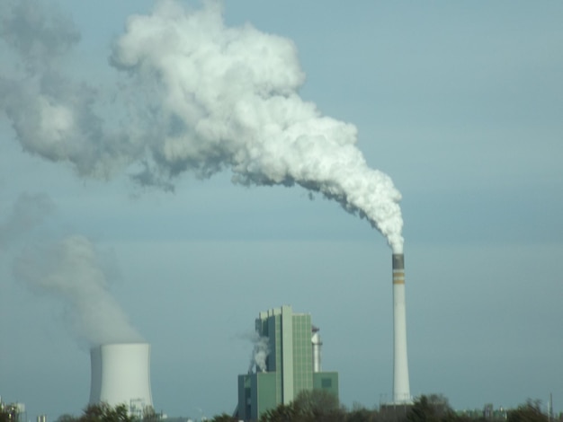 Power plant chimney emitting smoke