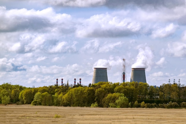 The power plant is hidden behind the forest overcast