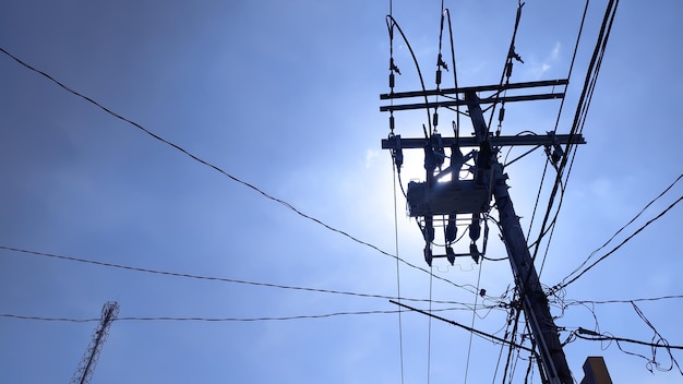 A power pole with a sky background