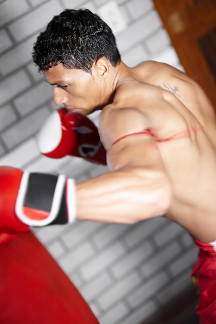 Photo power punching bag or sports man boxer or fighter training performance for kickboxing contest competition or challenge mma action gym equipment or strong warrior practice impact for boxing fight