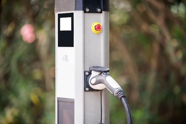 Power supply for electric car charging. Electric car charging station. Blurred Background