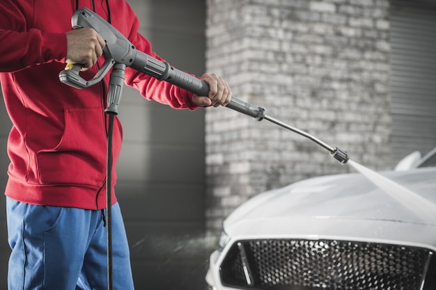 Power Washing Modern Car