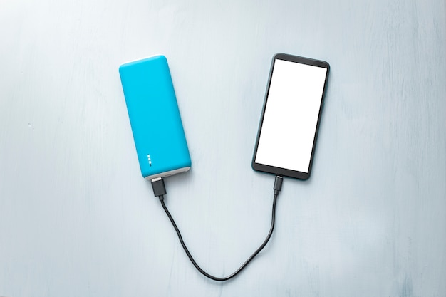 Powerbank en mobiele telefoon, smartphone.