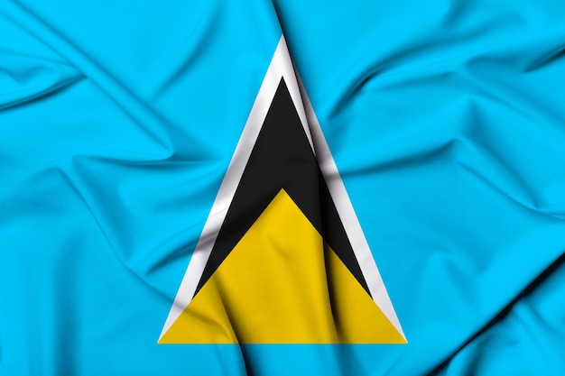 Prachtig zwaaiende en gestreepte achtergrondtextuur van de vlag van Sint-Lucia met levendige kleuren