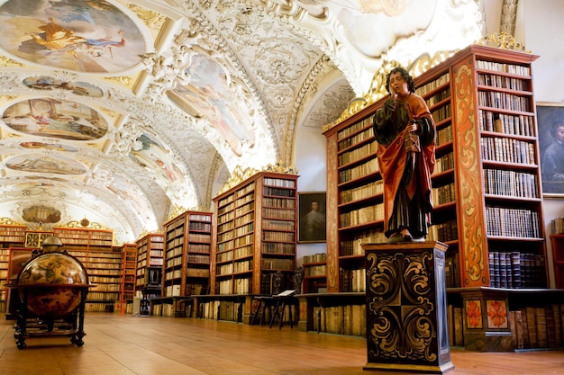 prague may 17 plurality of stacks of books in ancient library of strahov monastery on may 17 2014 in czech republic library keeps 200 000 prints from the period between the 16th 18th century