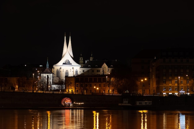 Prague at night, Emmaus monastery, reflection of lights in the river