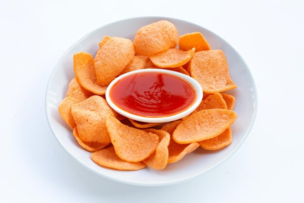 Prawn crackers on white background. Shrimp crispy rice snack