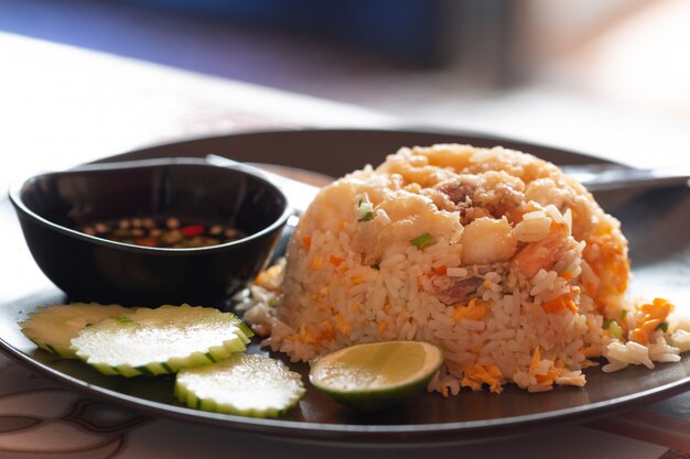 Prawn with fired rice in ceramics plate