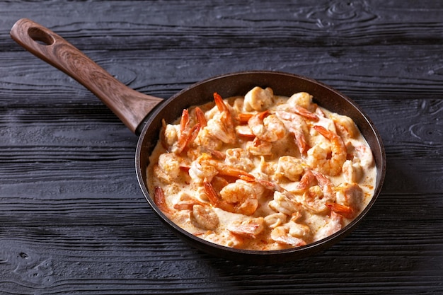 Prawns cooked in rich creamy Alfredo sauce