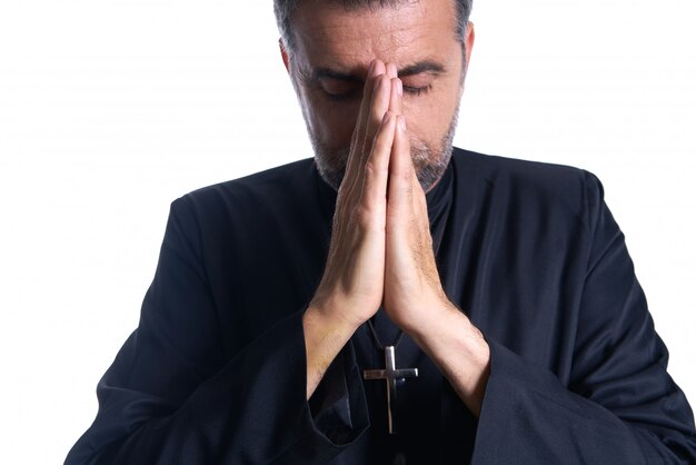 Praying hands priest portrait of male