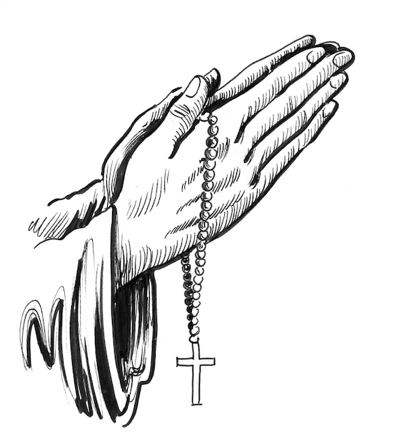 Photo praying hands with crucifixion. ink black and white drawing