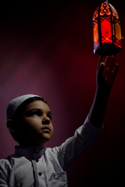 Praying muslim boy