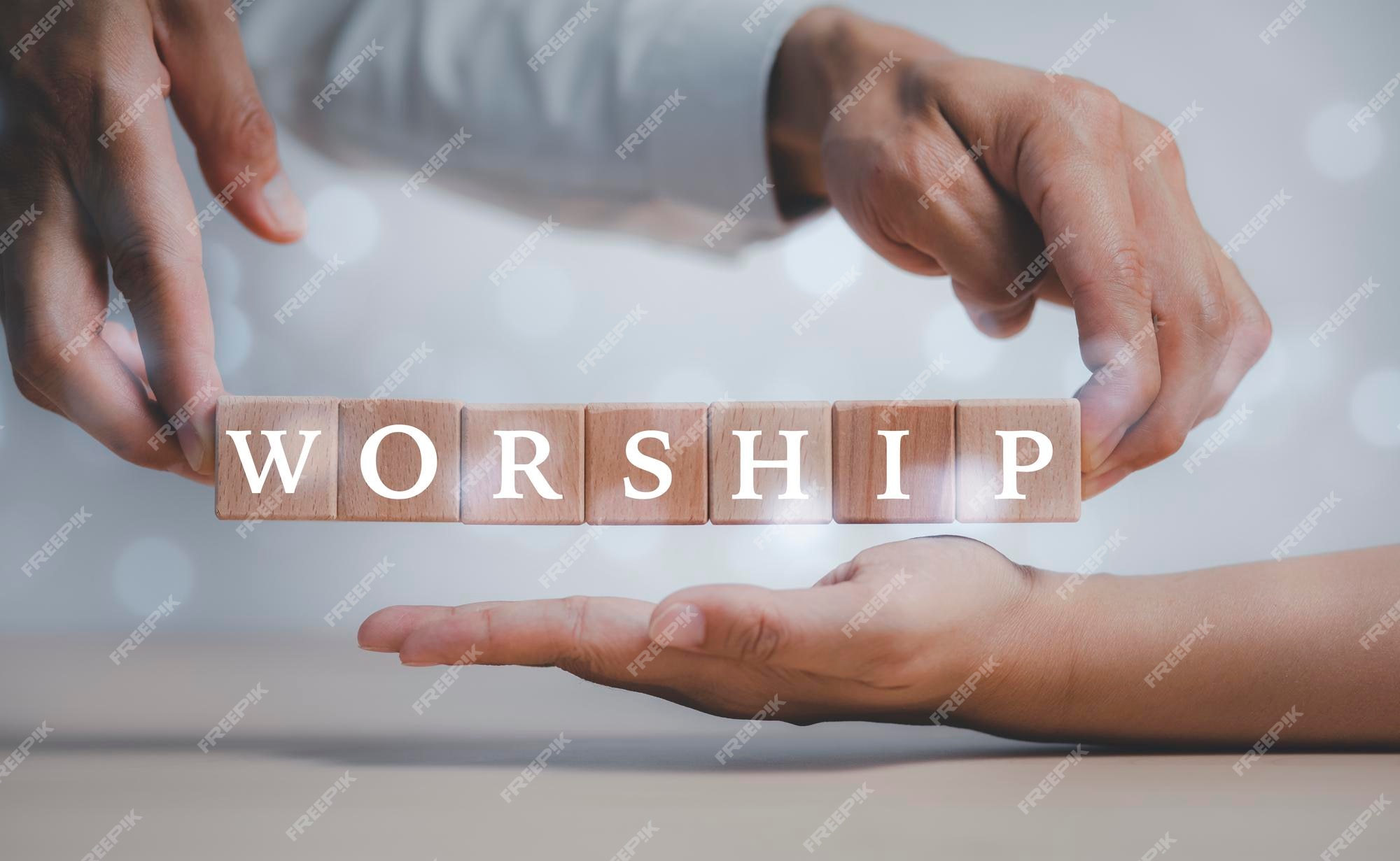 Premium Photo | Praying and worship concept, hand hold cubes woods block on  table with word worship on cubes woods block on the white background,  meaning of praying to god,