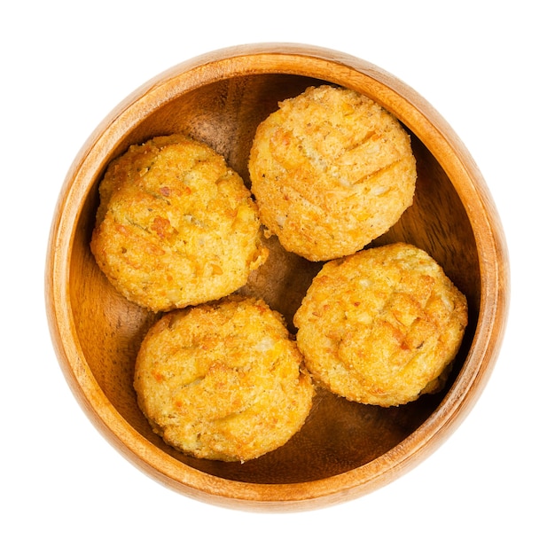 Pre fried vegan falafel balls in a wooden bowl