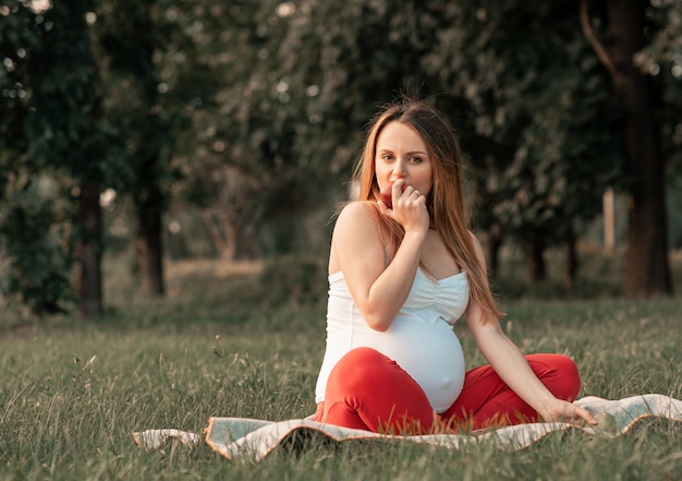 Pregnancy, sport and health lifestyle - young pregnant woman