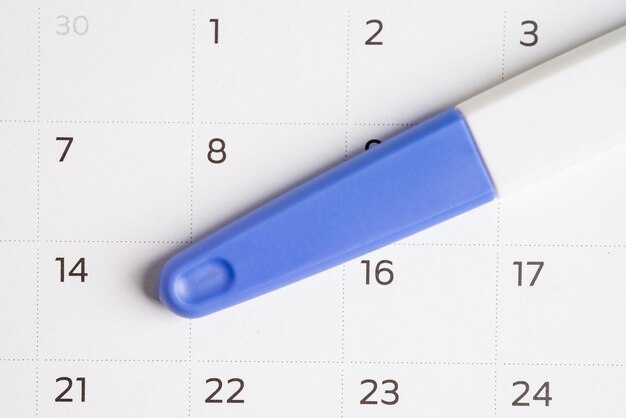 Photo pregnancy test for birth control on calendar contraception health and medicine