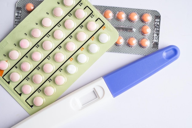 Photo pregnancy test and birth control pills contraception health and medicine