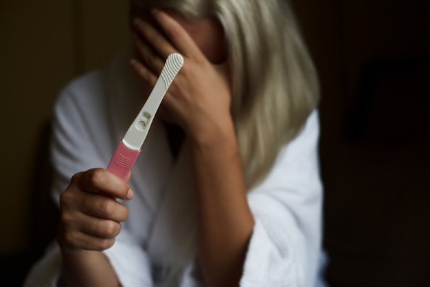 Photo pregnancy test with bad news