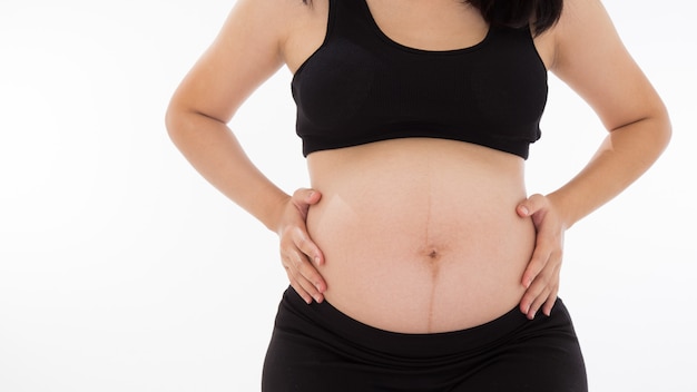 Pregnant Asian woman with white background