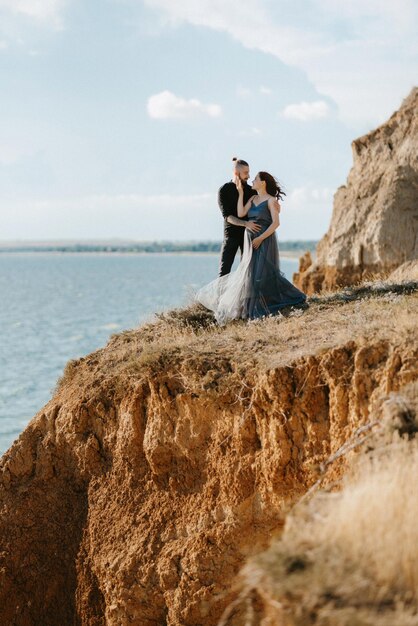 Pregnant girl and boyfriend on high hills