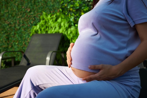 A pregnant girl of European appearance