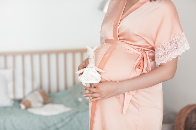 Pregnant woman. Belly close up picture