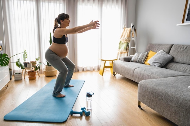 Pregnant woman doing exercises