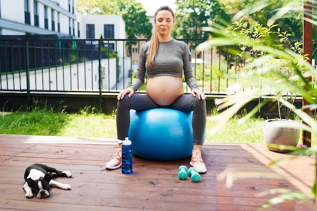 Pregnant woman during the exercise