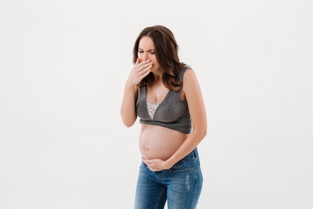 Pregnant woman feeling sick.