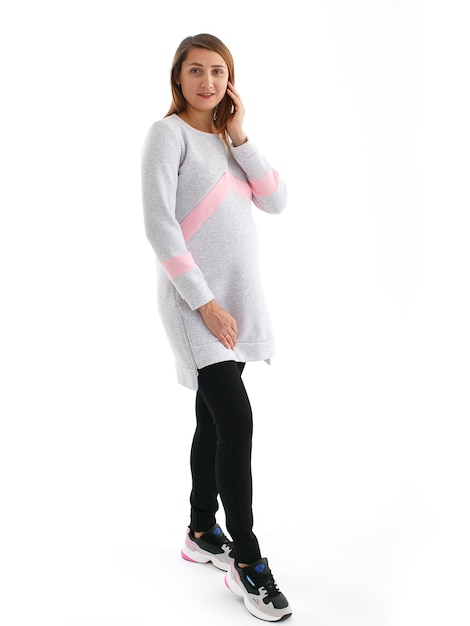 pregnant woman in full height on a white background